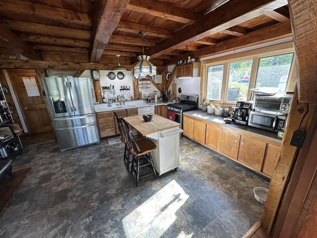 396 Smyrna Town Line Rd, Smyrna, ME 04780 - kitchen with stainless steel appliances, a wood ceiling with exposed beams, decorative light fixtures, and a kitchen breakfast bar