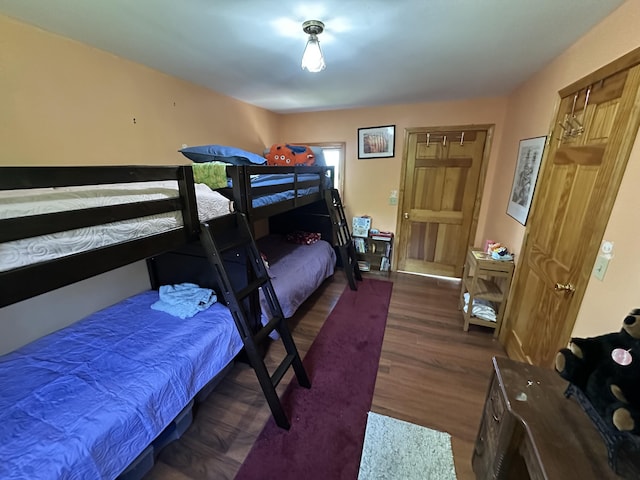 396 Smyrna Town Line Rd, Smyrna, ME 04780 - bedroom featuring wood finished floors