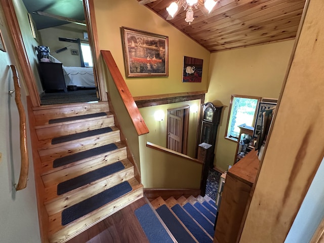 396 Smyrna Town Line Rd, Smyrna, ME 04780 - staircase featuring wood finished floors, wooden ceiling, and vaulted ceiling