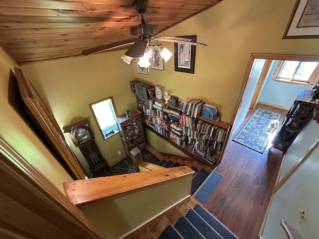 396 Smyrna Town Line Rd, Smyrna, ME 04780 - staircase featuring wood finished floors, ceiling fan, wood ceiling, and lofted ceiling