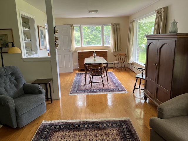 241 Bristol Rd, Damariscotta, ME 04543 - dining area featuring light wood finished floors and a baseboard radiator
