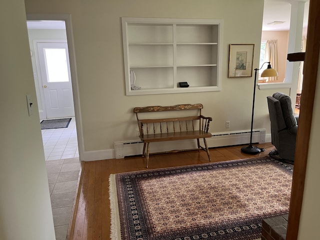 241 Bristol Rd, Damariscotta, ME 04543 - hall with hardwood / wood-style flooring, a baseboard heating unit, and plenty of natural light