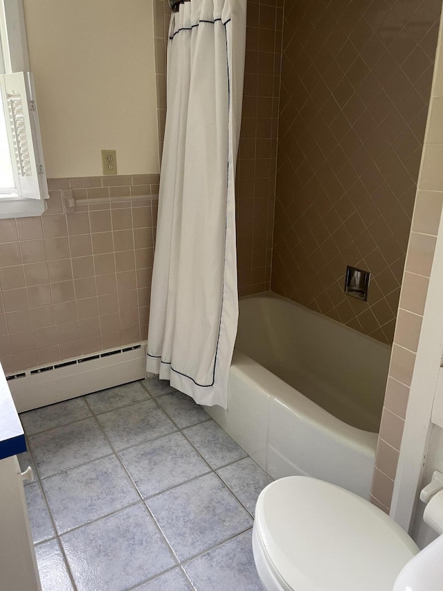 241 Bristol Rd, Damariscotta, ME 04543 - full bath with baseboard heating, tile patterned floors, shower / tub combo, and tile walls