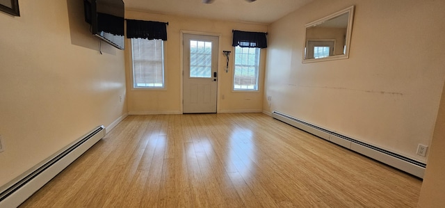 35 Mathews Ave Unit 6, Waterville, ME 04901 - entryway with baseboard heating and wood finished floors