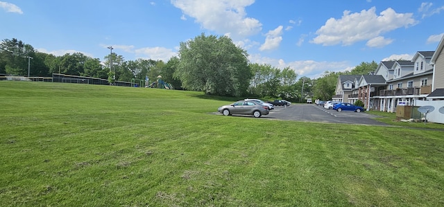 35 Mathews Ave Unit 6, Waterville, ME 04901 - uncovered parking lot with a residential view