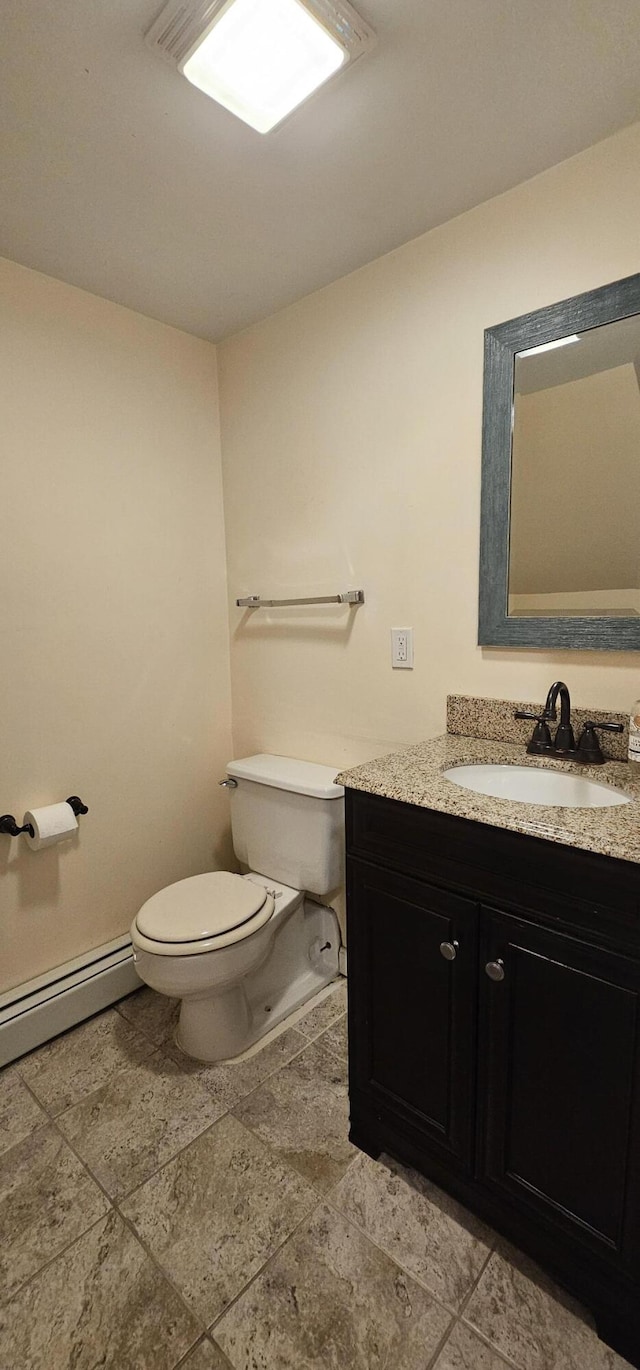 35 Mathews Ave Unit 6, Waterville, ME 04901 - bathroom featuring vanity and baseboard heating