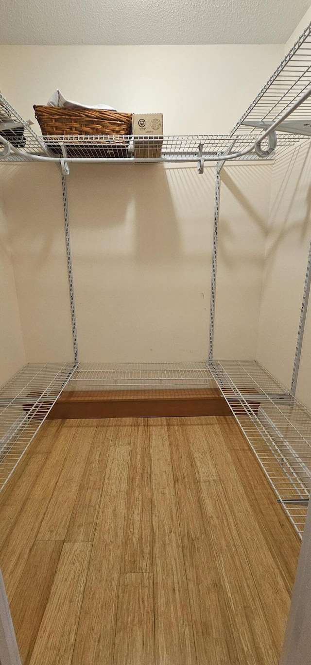 35 Mathews Ave Unit 6, Waterville, ME 04901 - walk in closet with wood finished floors