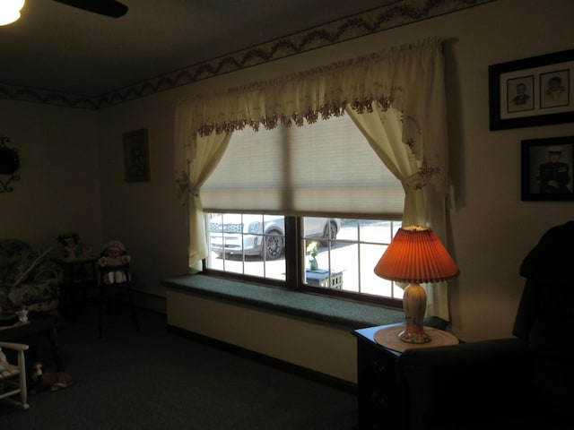 242 Newport Rd, Corinna, ME 04928 - living area featuring carpet and a ceiling fan