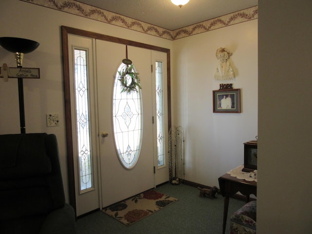 242 Newport Rd, Corinna, ME 04928 - foyer entrance with carpet flooring