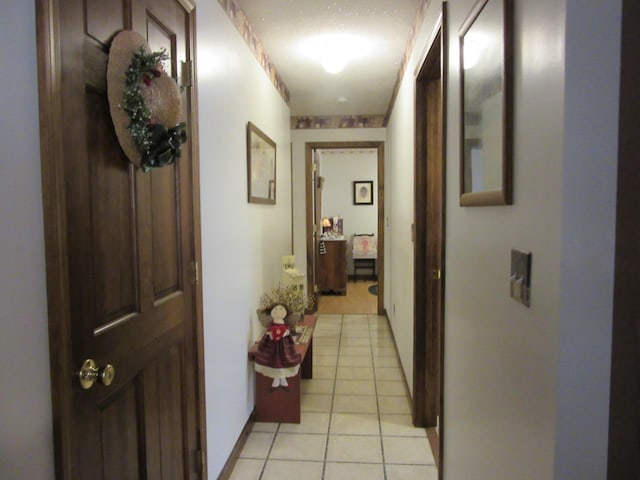 242 Newport Rd, Corinna, ME 04928 - corridor with light tile patterned floors