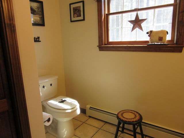 242 Newport Rd, Corinna, ME 04928 - bathroom with tile patterned floors and a baseboard heating unit