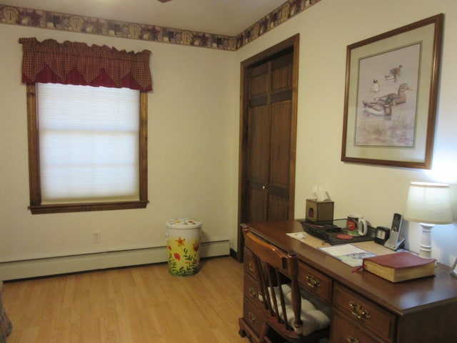 242 Newport Rd, Corinna, ME 04928 - home office featuring light wood-style floors, baseboard heating, and a ceiling fan