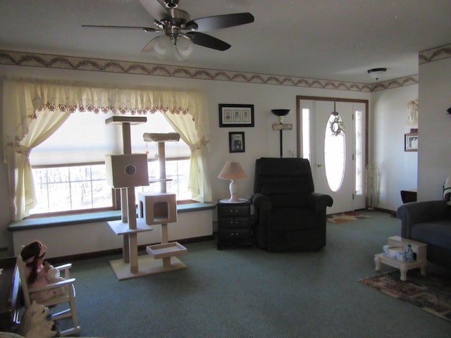 242 Newport Rd, Corinna, ME 04928 - carpeted living room featuring ceiling fan