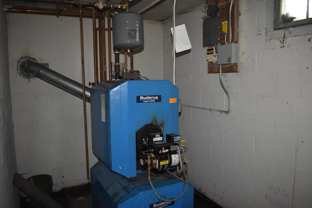 25 Ariel St, Lincoln, ME 04457 - utility room with a heating unit
