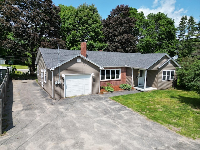 25 Ariel St, Lincoln, ME 04457 - ranch-style home with a chimney, asphalt driveway, an attached garage, a shingled roof, and a front lawn