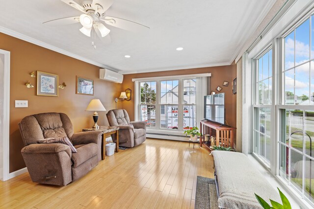 25 Harding St, Biddeford, ME 04005 - living area with a wall mounted air conditioner, healthy amount of natural light, ornamental molding, wood finished floors, and recessed lighting