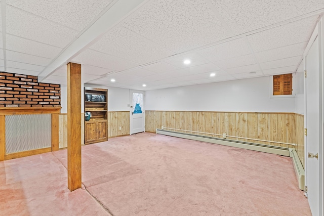 25 Harding St, Biddeford, ME 04005 - finished below grade area with wainscoting, baseboard heating, carpet, a drop ceiling, and recessed lighting