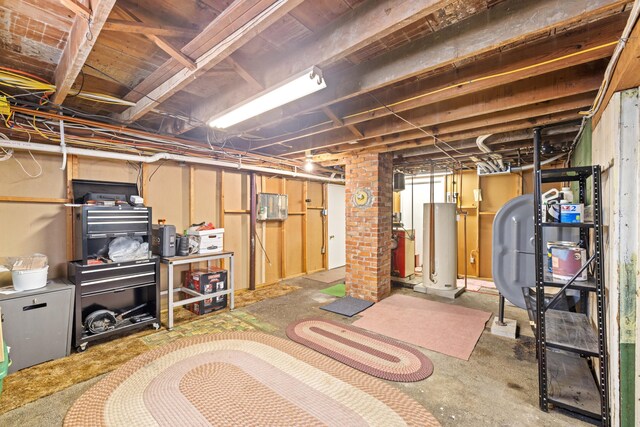 25 Harding St, Biddeford, ME 04005 - unfinished below grade area with water heater and heating fuel