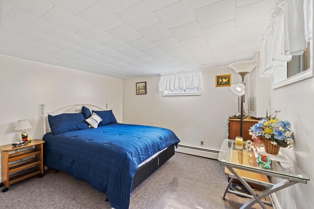25 Harding St, Biddeford, ME 04005 - bedroom featuring a baseboard heating unit and carpet