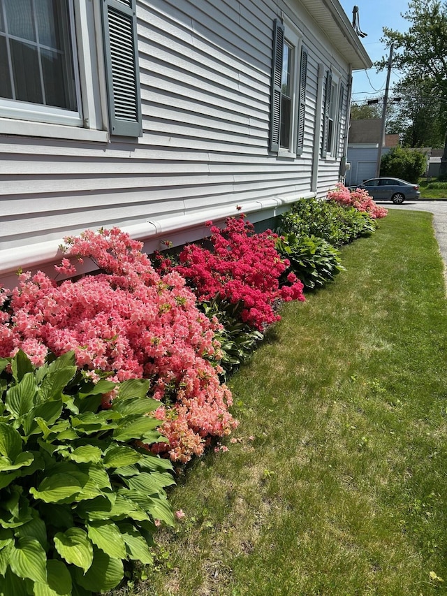 25 Harding St, Biddeford, ME 04005 - view of home's exterior with a lawn