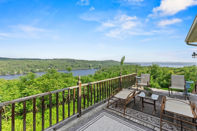 33 Lakeview Ln, Harrison, ME 04040 - wooden terrace with a water view and a view of trees