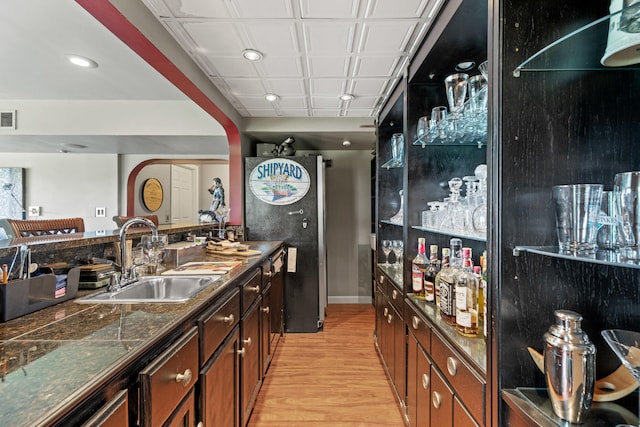 33 Lakeview Ln, Harrison, ME 04040 - indoor bar featuring light wood-type flooring, arched walkways, and recessed lighting