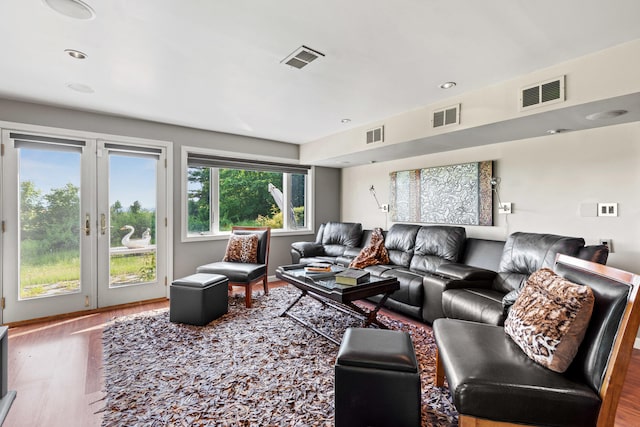 33 Lakeview Ln, Harrison, ME 04040 - living room featuring wood finished floors, french doors, and recessed lighting