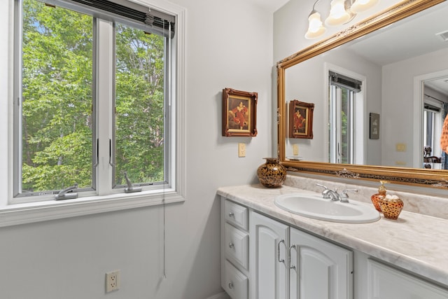 33 Lakeview Ln, Harrison, ME 04040 - bathroom with vanity and healthy amount of natural light