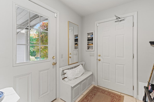 33 Lakeview Ln, Harrison, ME 04040 - mudroom with healthy amount of natural light and light tile patterned flooring