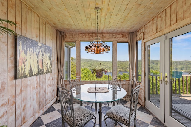 33 Lakeview Ln, Harrison, ME 04040 - sunroom / solarium with wooden walls, wood ceiling, a chandelier, and french doors
