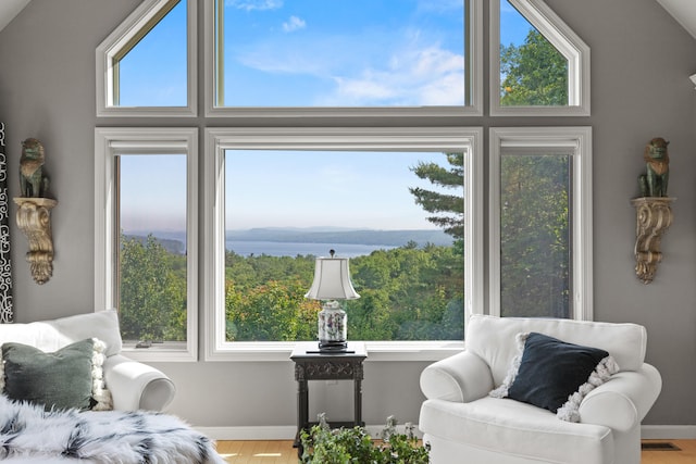 33 Lakeview Ln, Harrison, ME 04040 - sitting room featuring wood finished floors and a water view