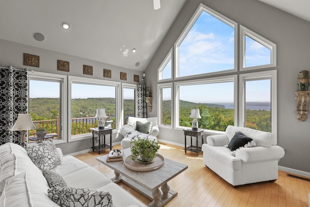 33 Lakeview Ln, Harrison, ME 04040 - living room featuring light wood finished floors, recessed lighting, and high vaulted ceiling