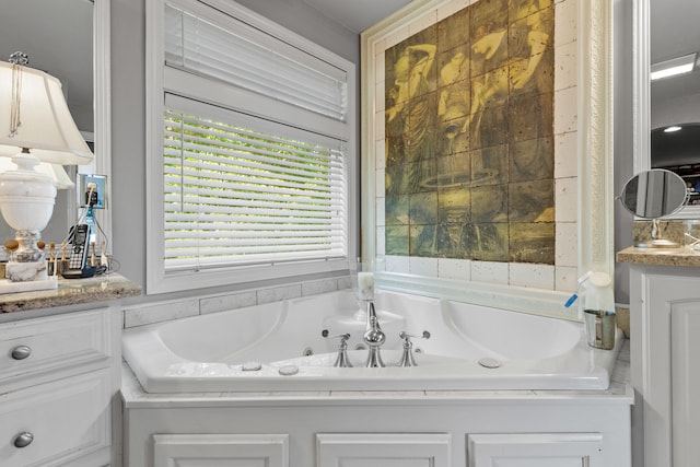 33 Lakeview Ln, Harrison, ME 04040 - full bath with a whirlpool tub, healthy amount of natural light, and vanity