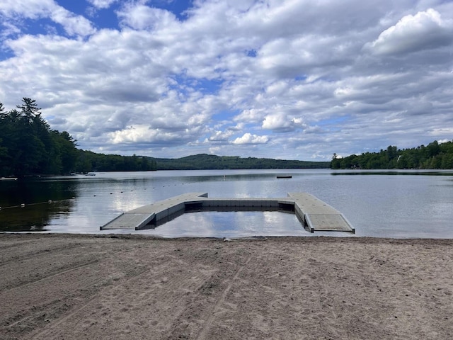 33 Lakeview Ln, Harrison, ME 04040 - dock area featuring a water view and a view of trees