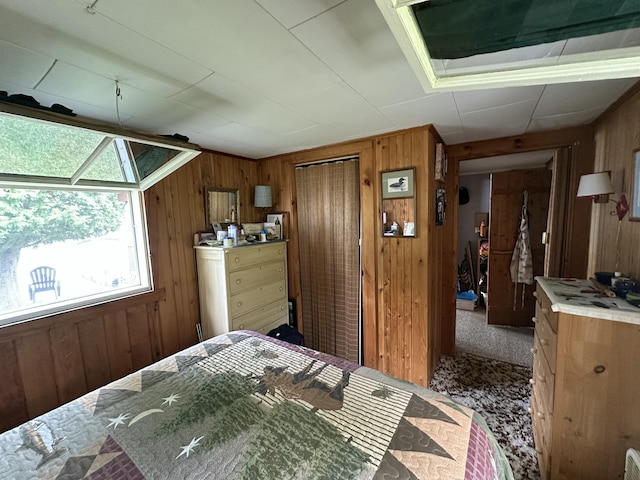 50 Forget Me Not Ln, Orient, ME 04471 - carpeted bedroom with wooden walls