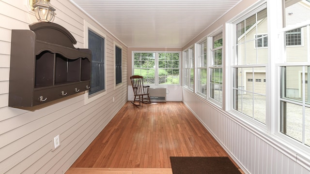 370 Center Conway Rd, Brownfield, ME 04010 - sunroom with hardwood / wood-style flooring and wood walls