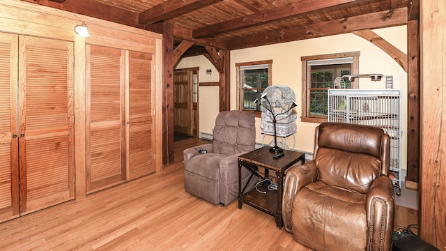 370 Center Conway Rd, Brownfield, ME 04010 - sitting room featuring wood finished floors, a wooden ceiling with exposed beams, arched walkways, and a baseboard heating unit