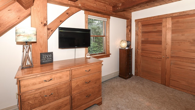 370 Center Conway Rd, Brownfield, ME 04010 - carpeted bedroom with a wood ceiling with exposed beams, a closet, and baseboard heating