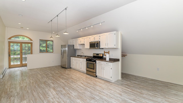 370 Center Conway Rd, Brownfield, ME 04010 - kitchen with stainless steel appliances, rail lighting, white cabinetry, dark countertops, and light wood finished floors