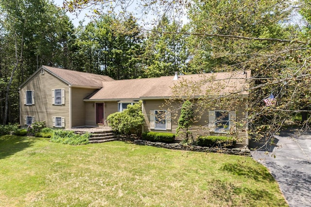 9 Kennebec Cir, Bath, ME 04530 - split level home with a front lawn and a shingled roof