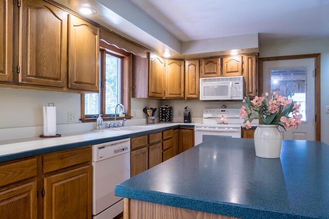 9 Kennebec Cir, Bath, ME 04530 - kitchen with white appliances and brown cabinetry