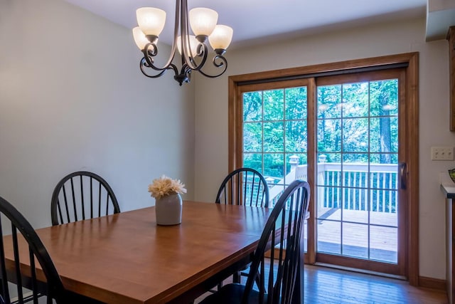 9 Kennebec Cir, Bath, ME 04530 - dining space featuring a chandelier and wood finished floors