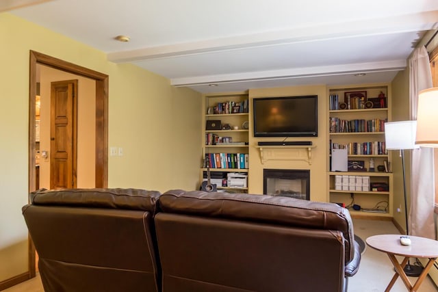 9 Kennebec Cir, Bath, ME 04530 - carpeted living area featuring a fireplace, beamed ceiling, and built in features