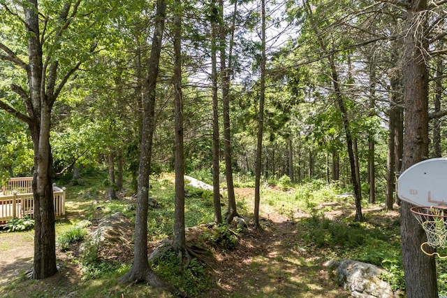 9 Kennebec Cir, Bath, ME 04530 - view of yard with a wooden deck and a wooded view