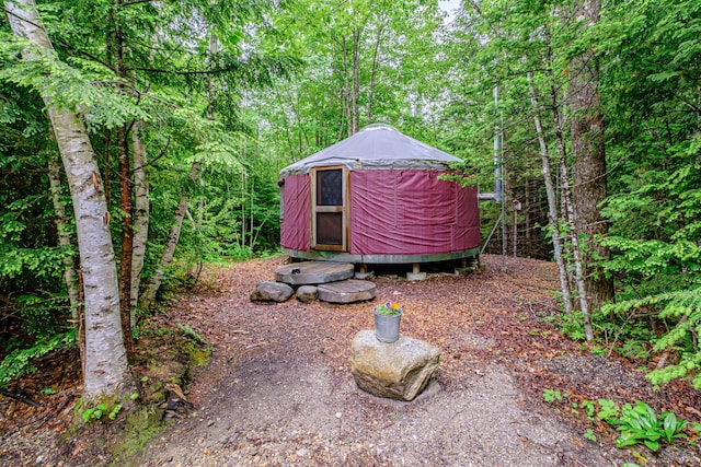 41 Dundee Rd, Albany Twp, ME 04217 - view of yard featuring a forest view and a storage shed
