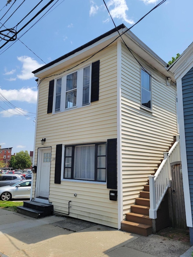 59 Washington St, Biddeford, ME 04005 - view of side of property featuring stairs