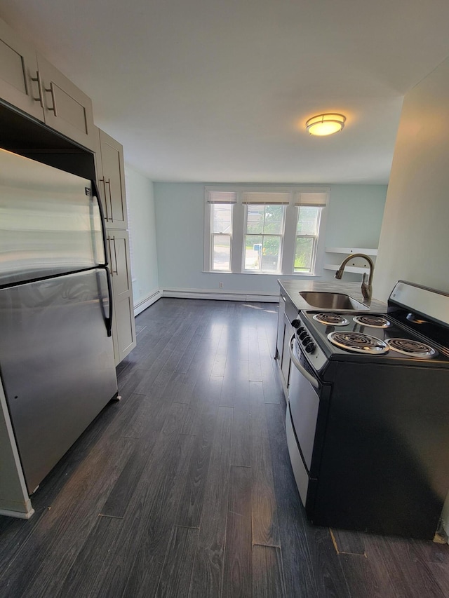 59 Washington St, Biddeford, ME 04005 - kitchen featuring stainless steel appliances and dark wood-style floors