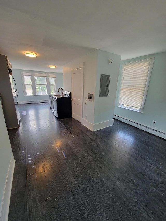 59 Washington St, Biddeford, ME 04005 - hall featuring dark wood finished floors, electric panel, and baseboard heating