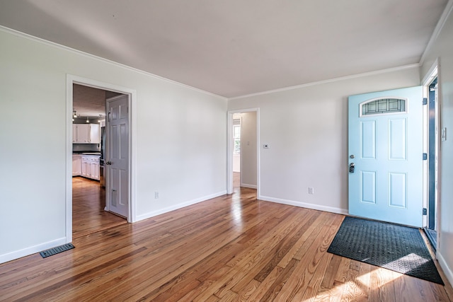 52 Mckinley St, South Portland, ME 04106 - foyer featuring ornamental molding and light wood-type flooring