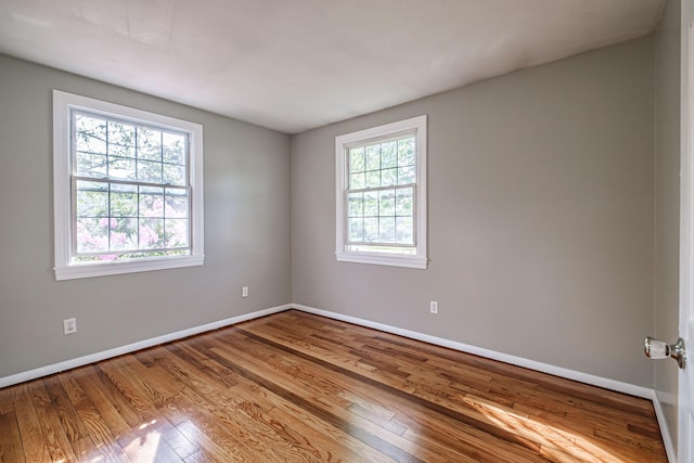 52 Mckinley St, South Portland, ME 04106 - spare room with wood finished floors and baseboards